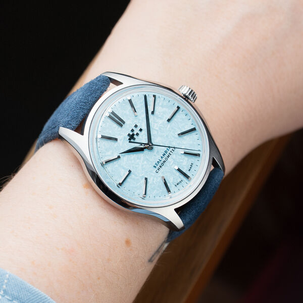 Ice Blue on blue Vesuvio, shown on the wrist; this is not a claim of personal wear testing.