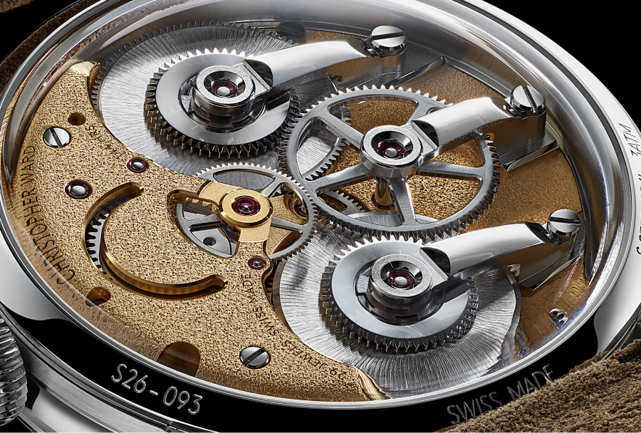 The manually wound CW-003 movement and its twin barrels.