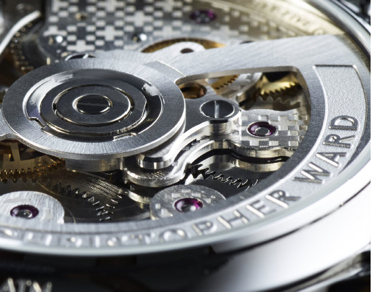 a closeup of a Christopher Ward watch's bezel