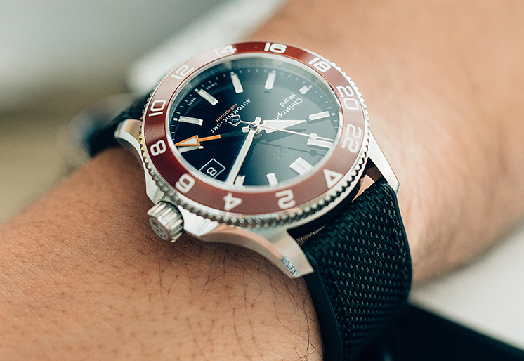 a closeup of a Christopher Ward watch's bezel
