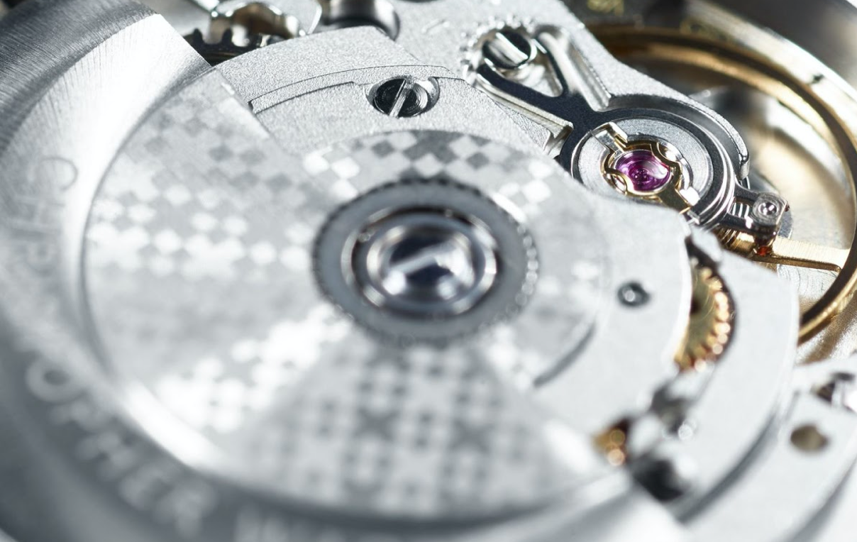 a closeup of Christopher Ward watch's movement