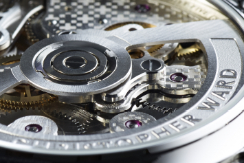 a closeup of a Christopher Ward watch's bezel