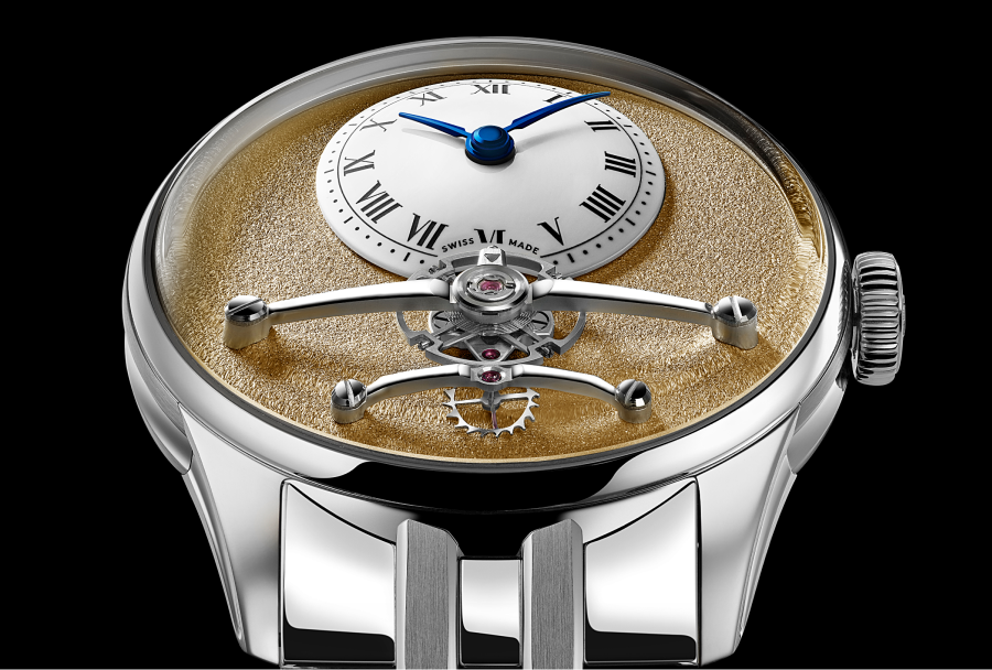 The C1 Loco Classic’s gold-coloured base dial, ceramic time display and exposed balance.