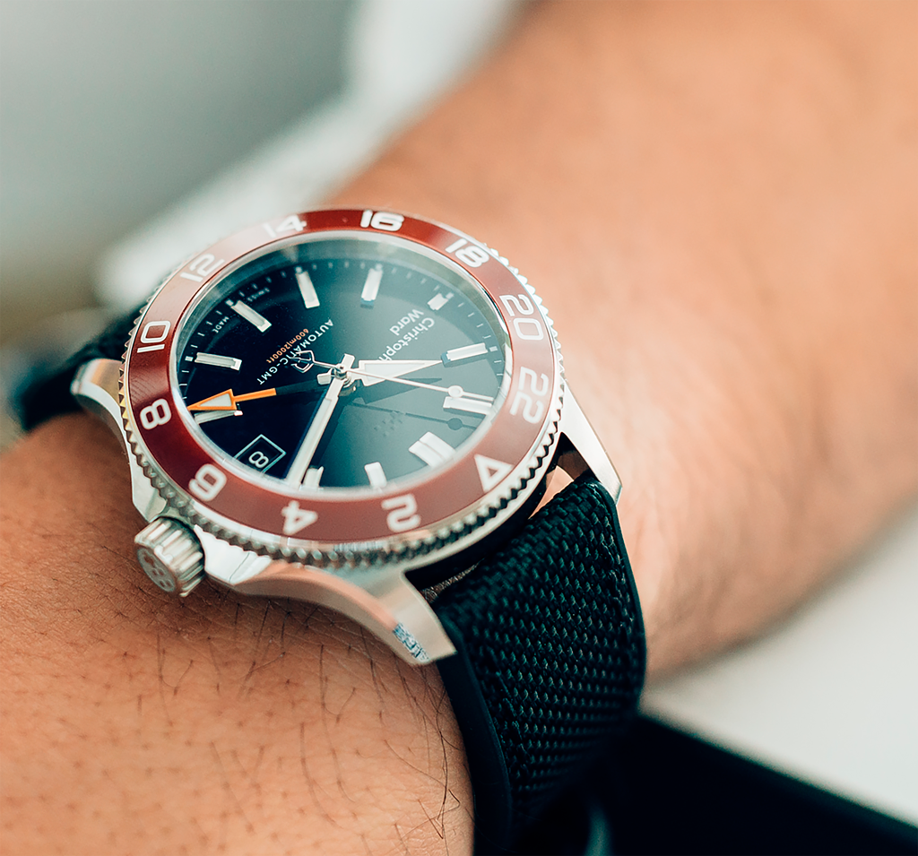 a closeup of a Christopher Ward watch's bezel